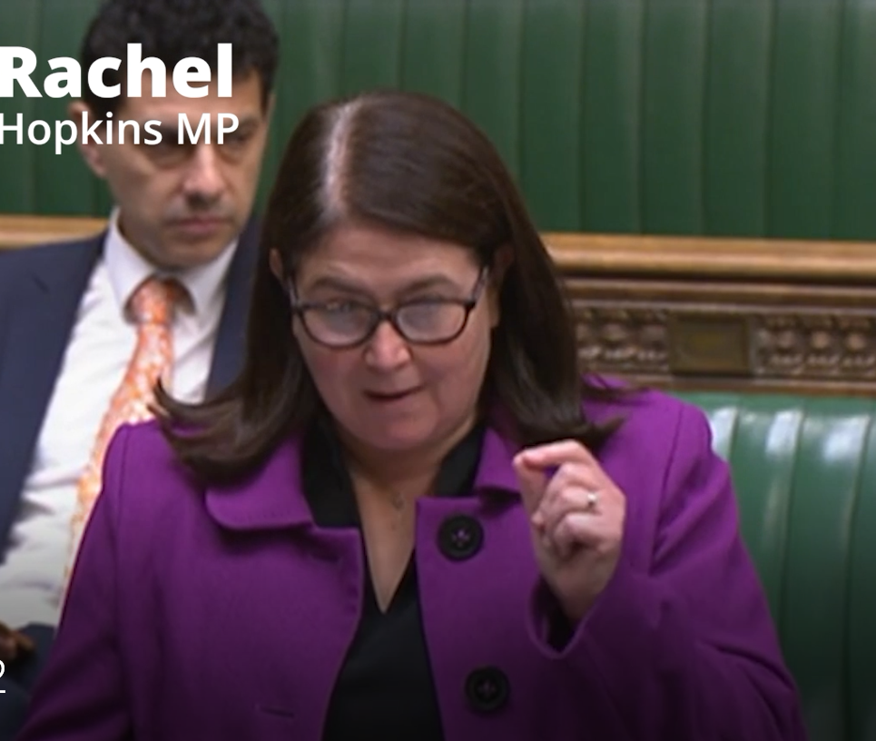 Rachel Hopkins MP in purple jacket asking question in Commons Chamber