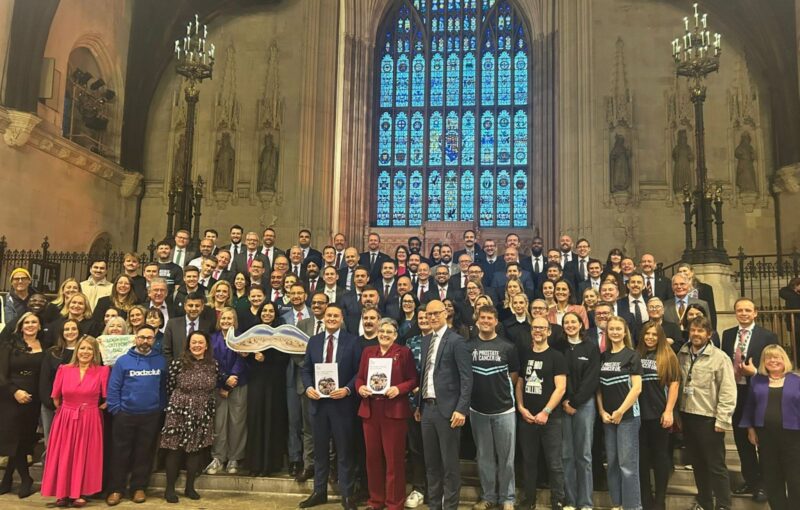 Rachel Hopkins MP and colleagues in Parliament welcoming the Men